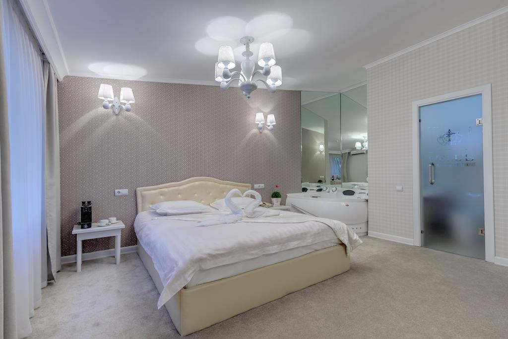 Well Sleep Hotel Алма Ата Стая снимка